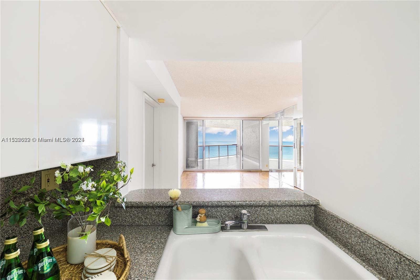 Representative kitchen with views to balcony