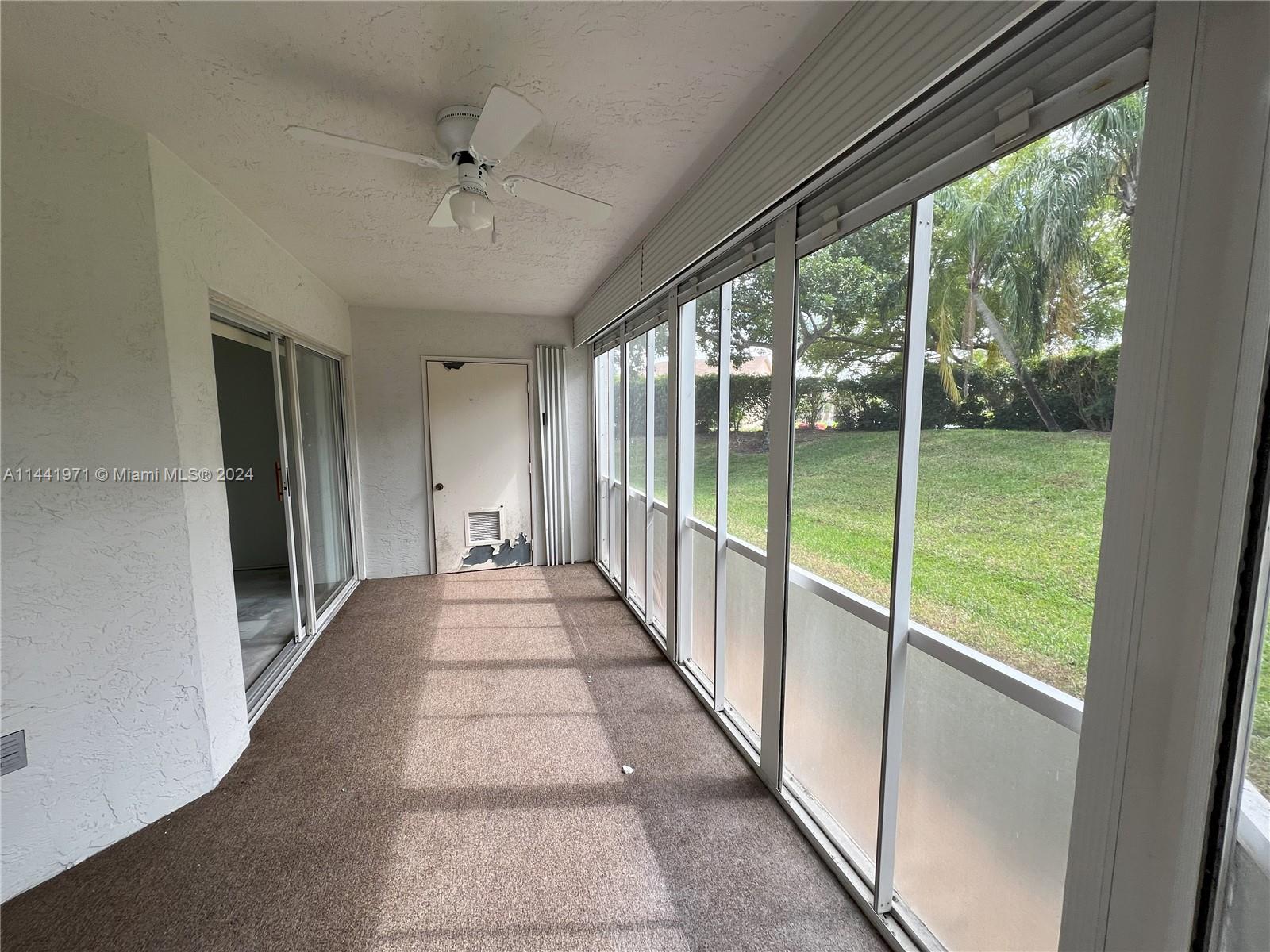 Back Porch with Roll down Shutters
