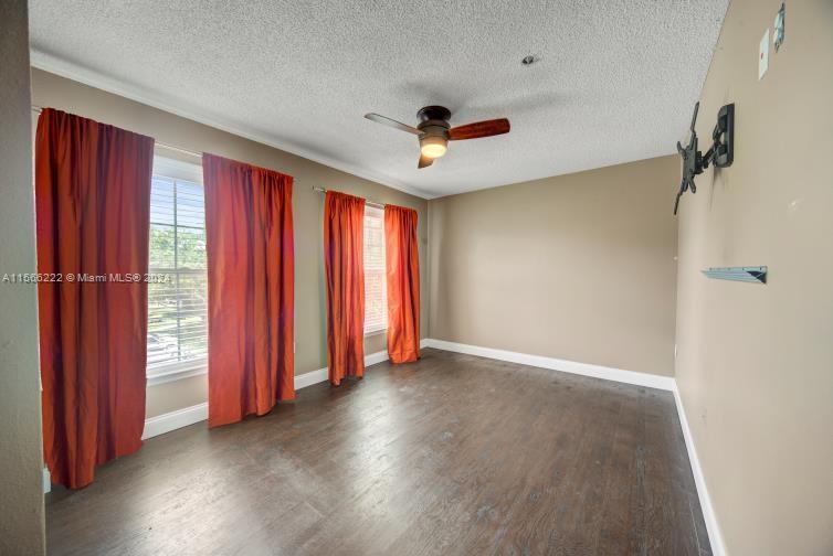 Bedroom #2 with ample lighting 2 large windows