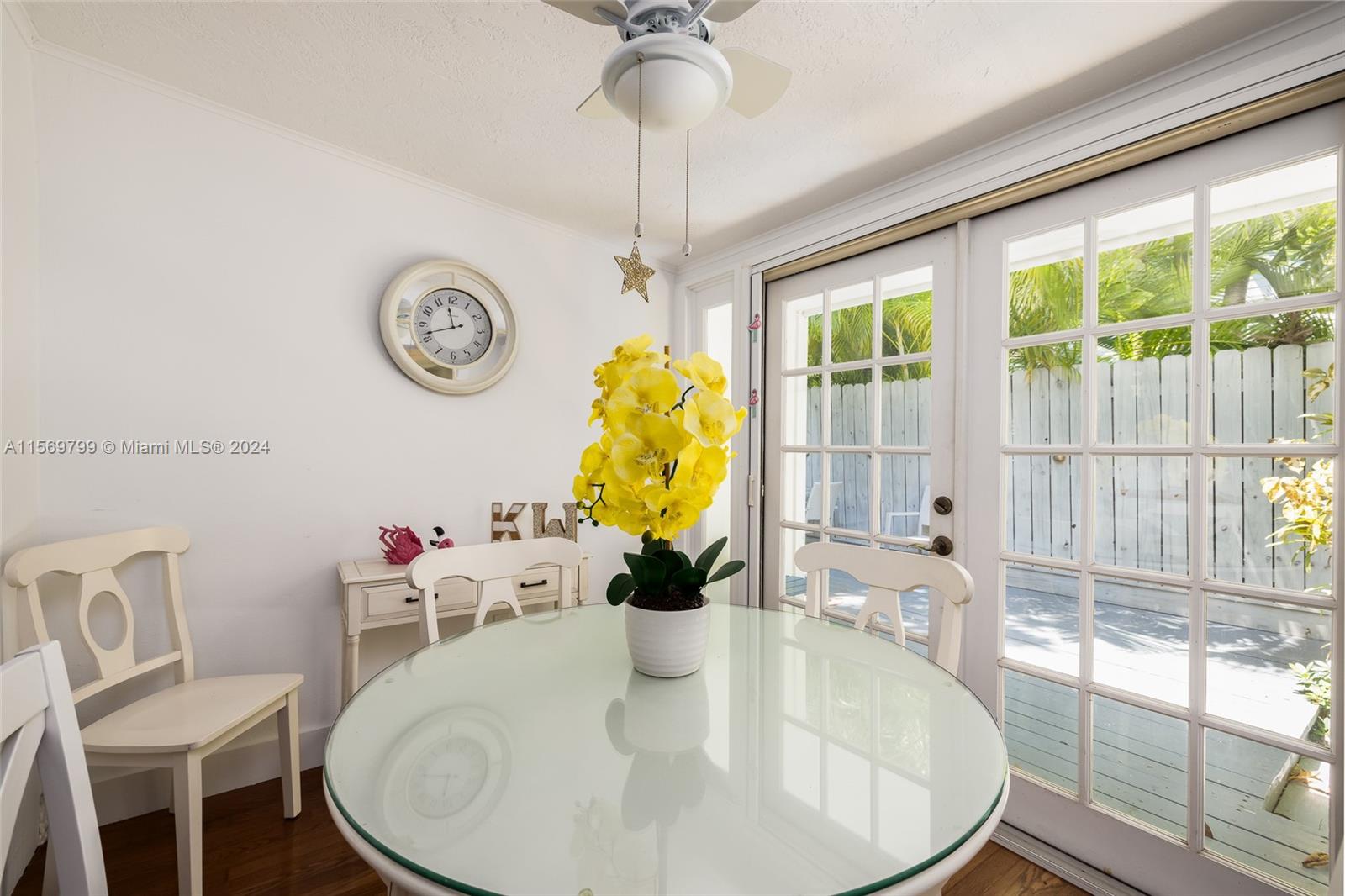 Light and Bright Dining Room with French Doors to the Deck