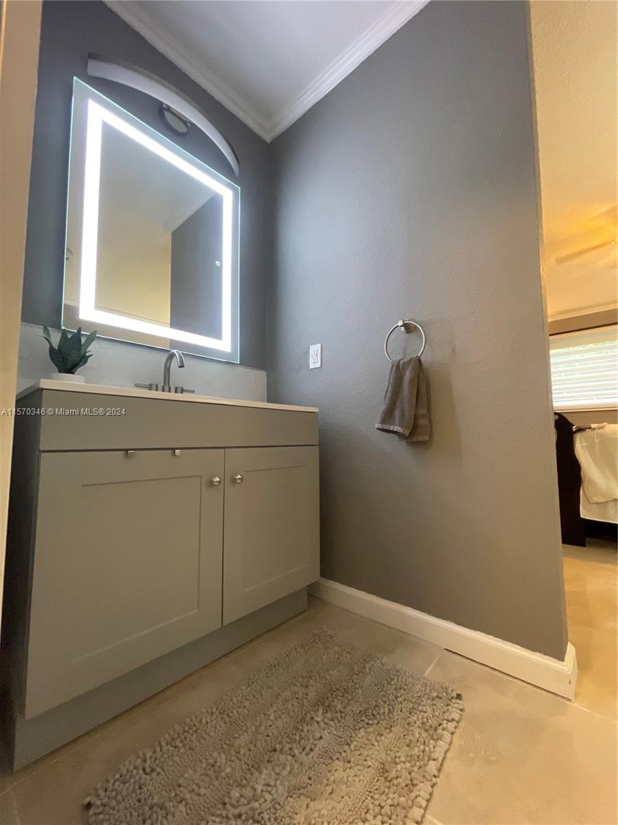 Main suite, bathroom, separate vanity with updated LED mirror