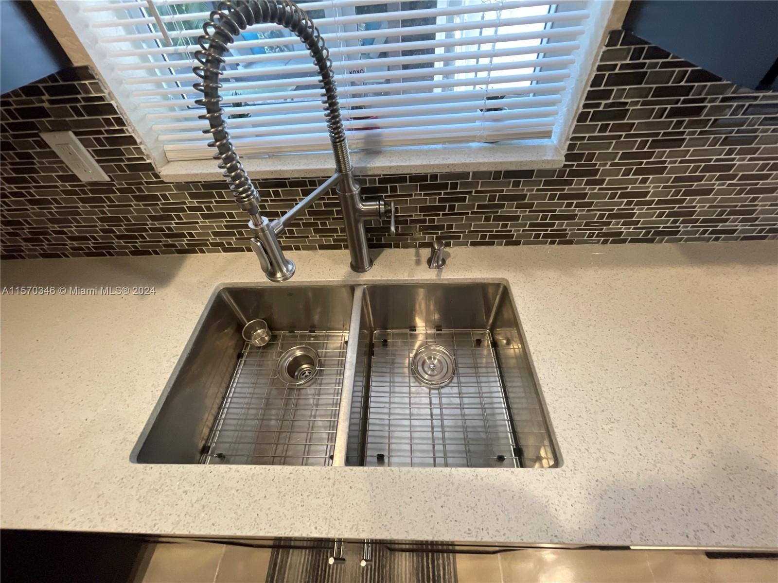Elevate your kitchen to new heights of elegance with the most stunning deep dual stainless steel sinks, accompanied by a luxurious and exquisitely crafted faucet.