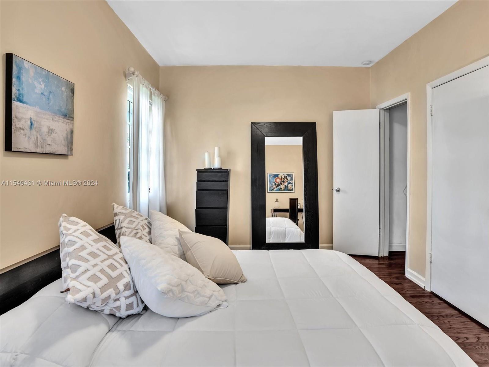 Bedroom with closet area.