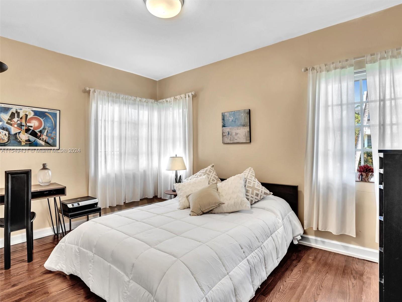 Bedroom with lots of natural lighting.