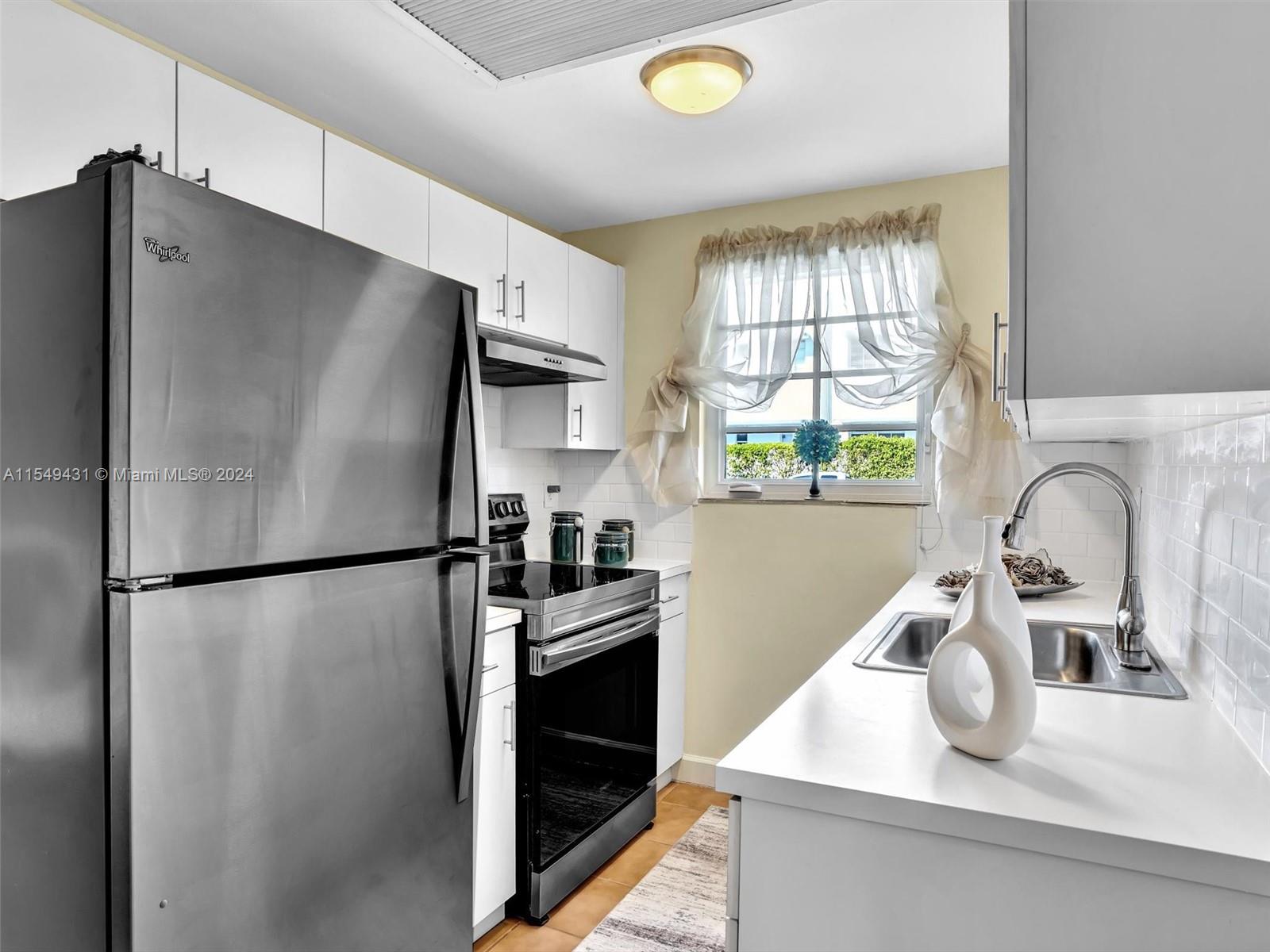 New stainless appliances to include dishwasher.