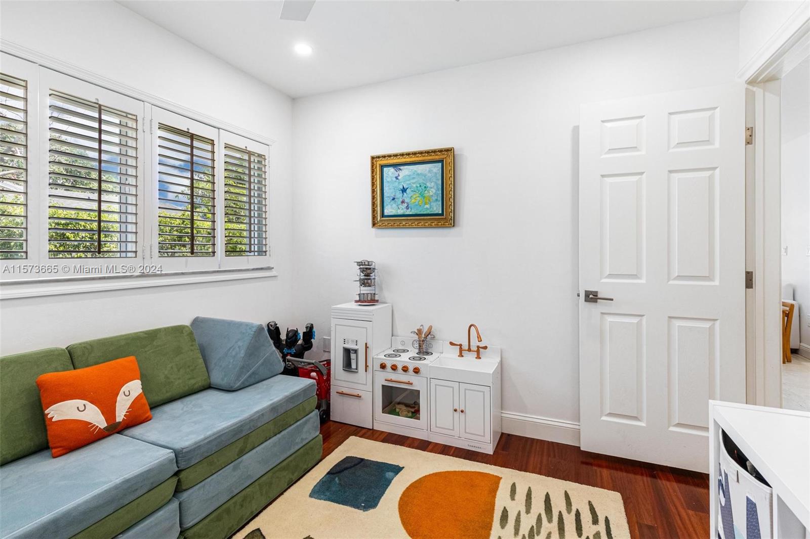 A full bathroom just off of this bedroom and the Family room features a walk-in shower