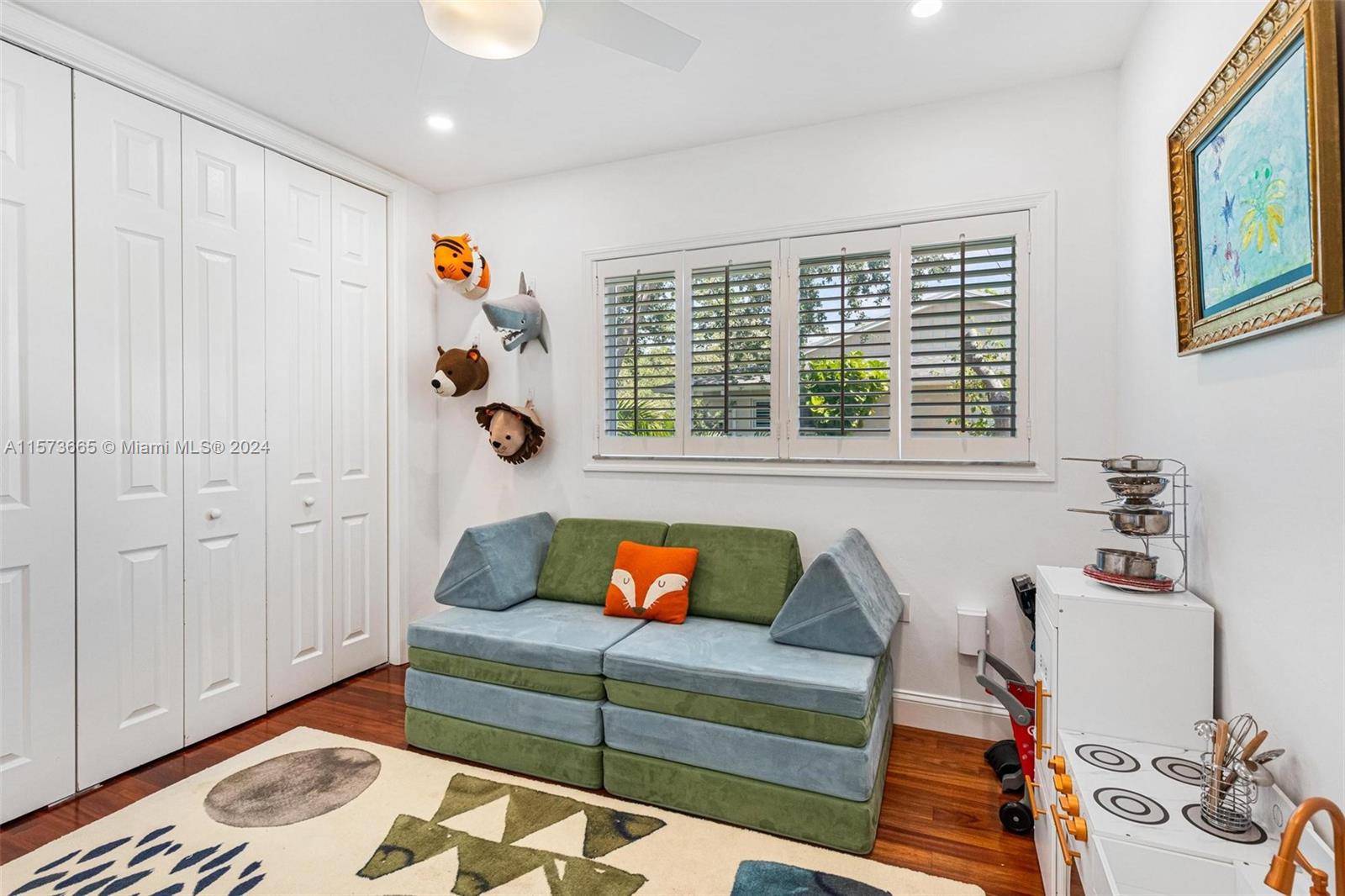 Bedroom #1 on north side of house currently used as a playroom