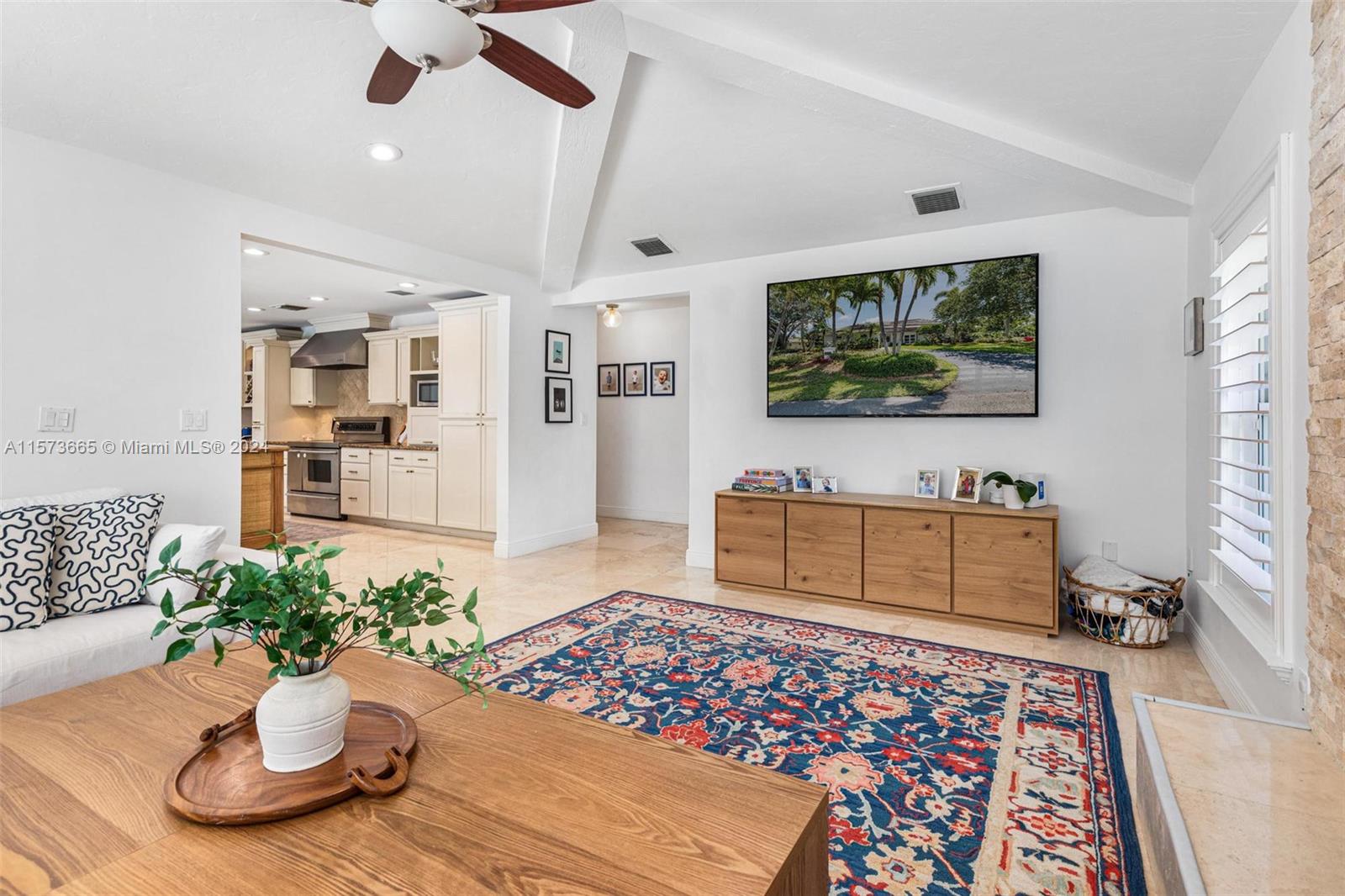 Cozy yet roomy family room off of the kitchen for easy entertaining and access