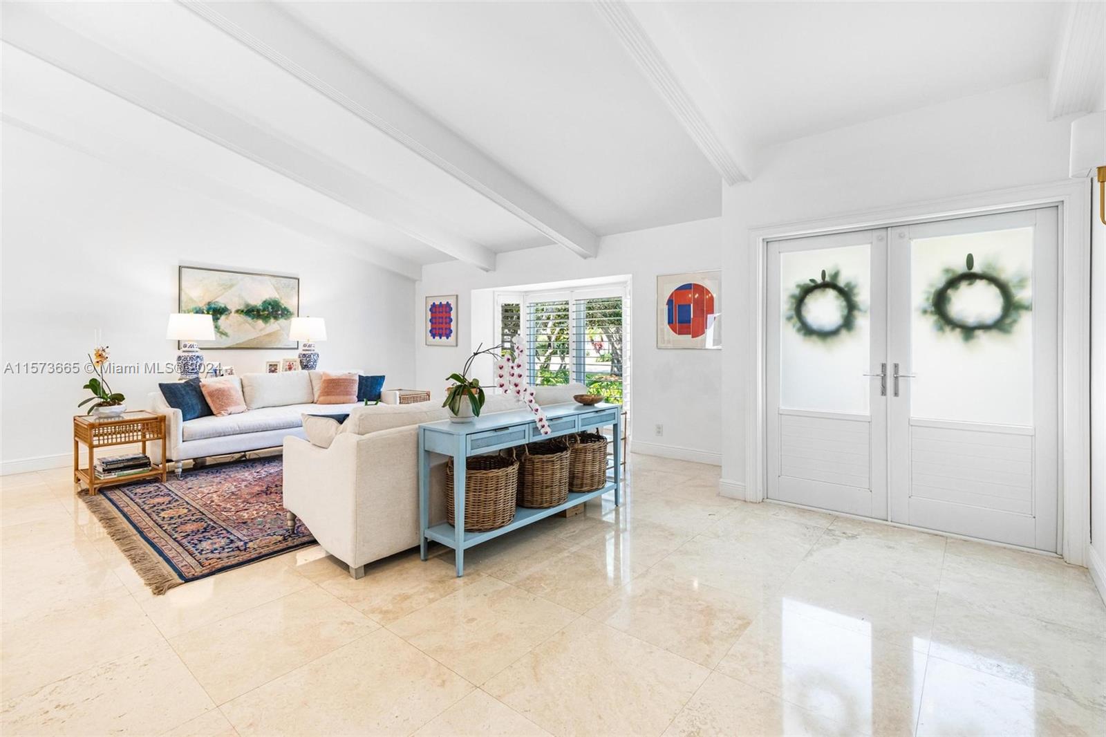 Vaulted ceilings lend to lots of light in the open and airy living room