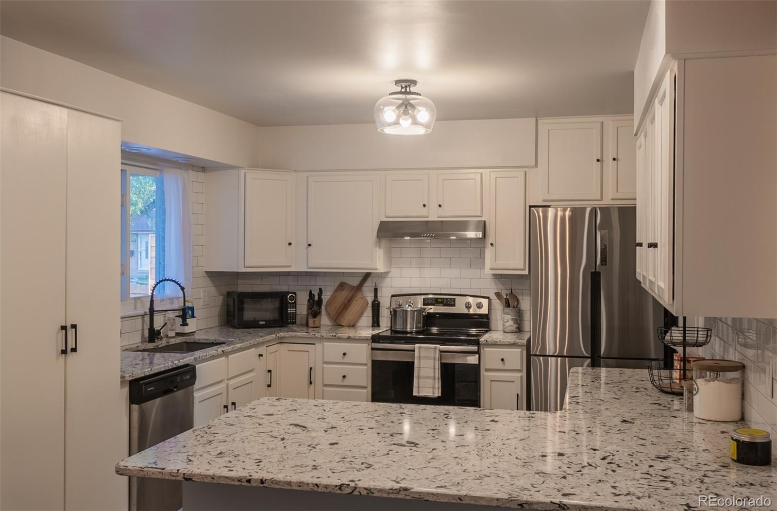 4947 Perry, Littleton, CO 80123, 4 Bedrooms Bedrooms, ,3 BathroomsBathrooms,Residential,For Sale,Perry,REC1855619