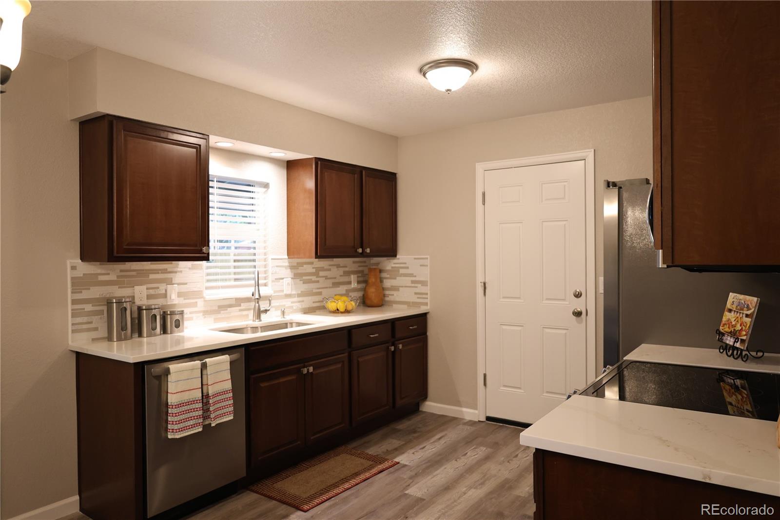 3558 Newland Street, Denver, CO 80235, 3 Bedrooms Bedrooms, ,1 BathroomBathrooms,Residential,For Sale,Newland,REC7443677