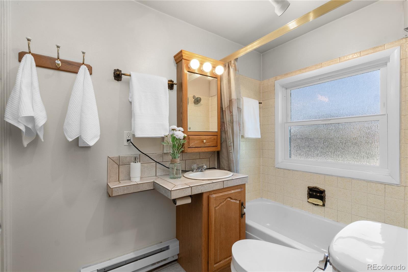 7302 Upham Court, Arvada, CO 80003, 3 Bedrooms Bedrooms, ,2 BathroomsBathrooms,Residential,For Sale,Upham,REC5062426