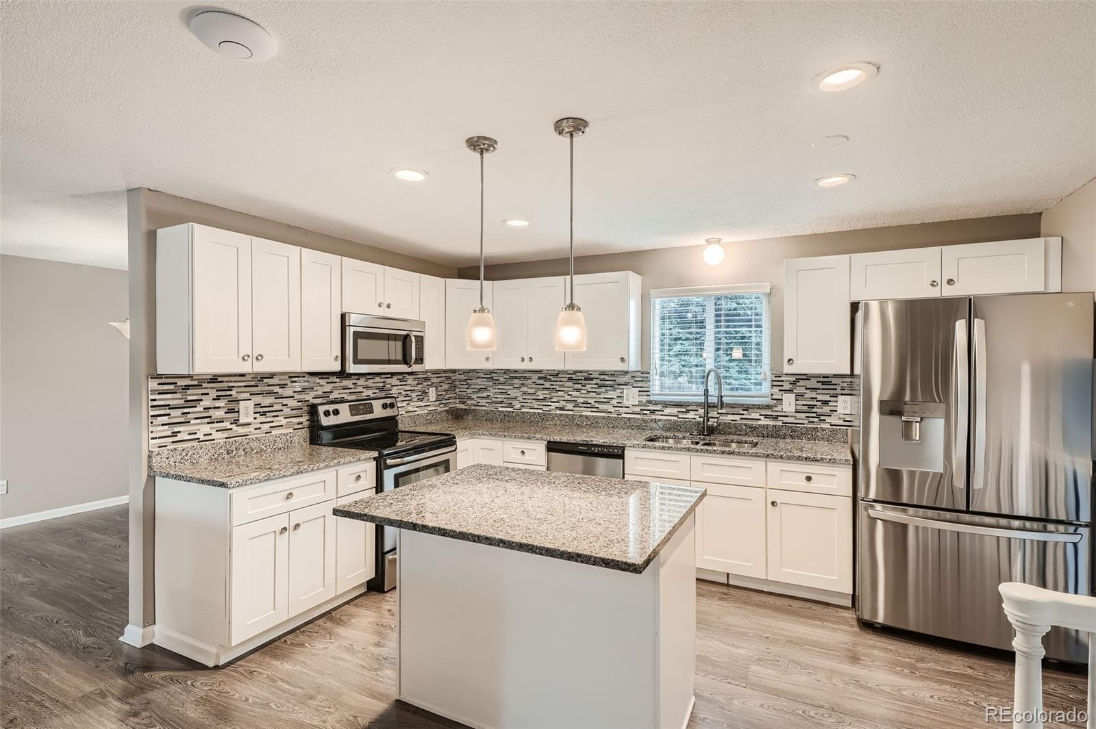 9014 Harvard Drive, Lakewood, CO 80227, 4 Bedrooms Bedrooms, ,3 BathroomsBathrooms,Residential,For Sale,Harvard,REC9967013