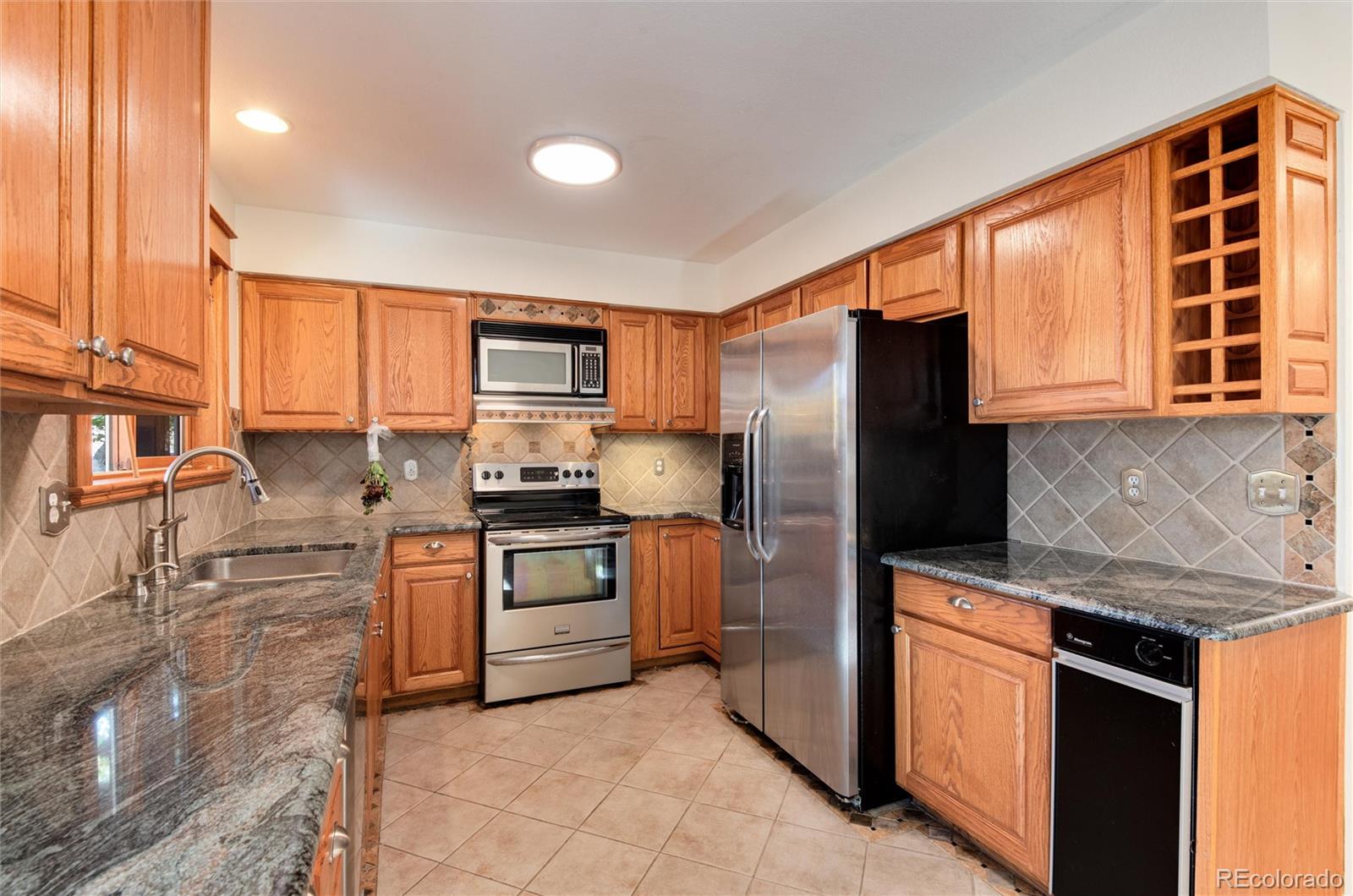 6731 S Newcombe Way, Littleton, CO 80127, 4 Bedrooms Bedrooms, ,4 BathroomsBathrooms,Residential,For Sale,Newcombe,REC5938238