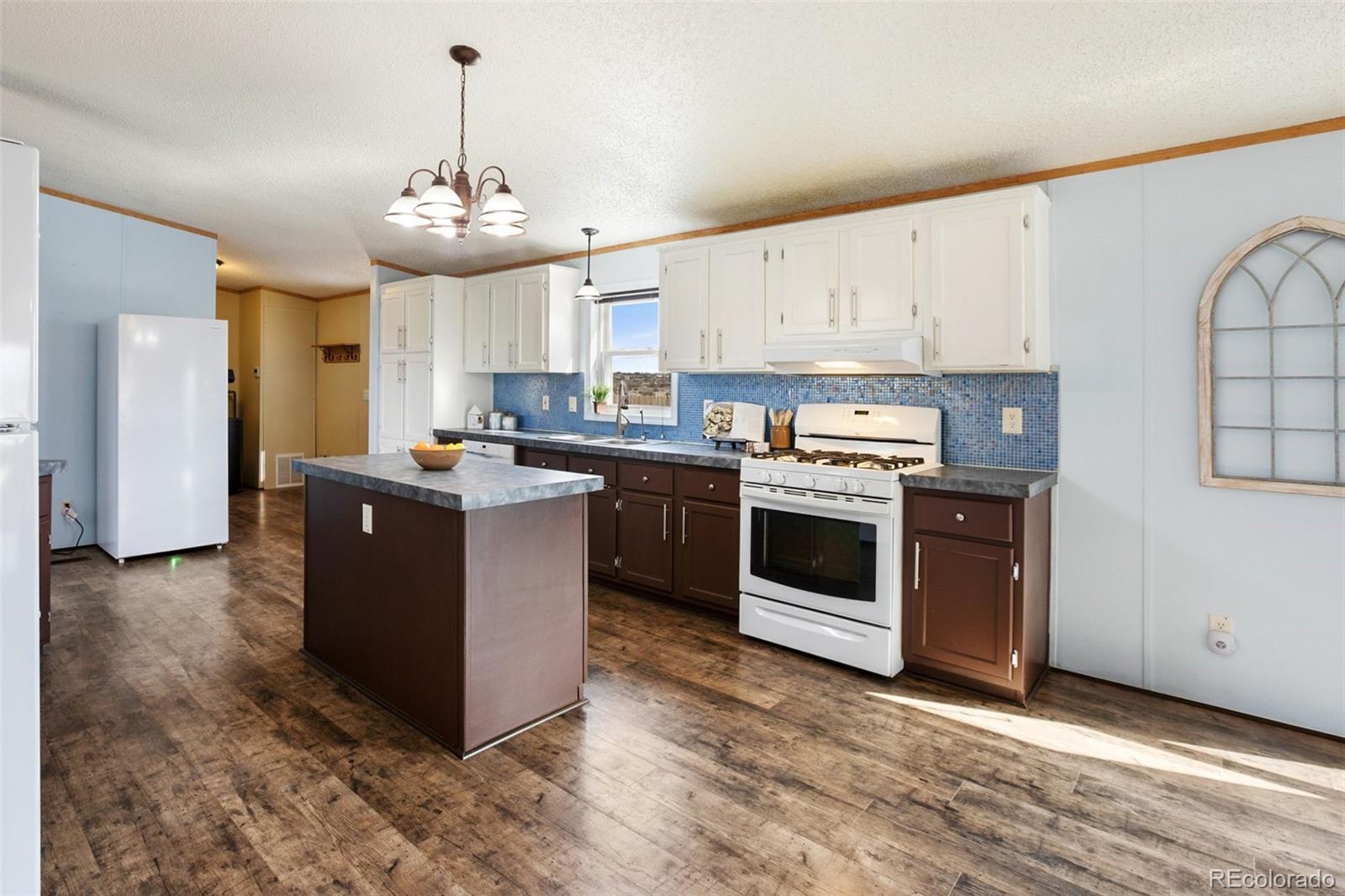 1376 B Street, Penrose, CO 81240, 3 Bedrooms Bedrooms, ,2 BathroomsBathrooms,Residential,For Sale,B,REC1994763