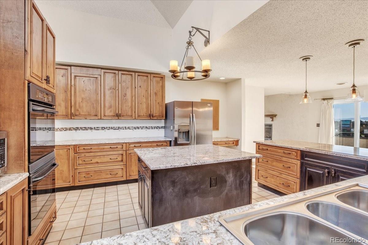 7720 Quincy Drive, Lakewood, CO 80235, 4 Bedrooms Bedrooms, ,6 BathroomsBathrooms,Residential,For Sale,Quincy,REC3636540