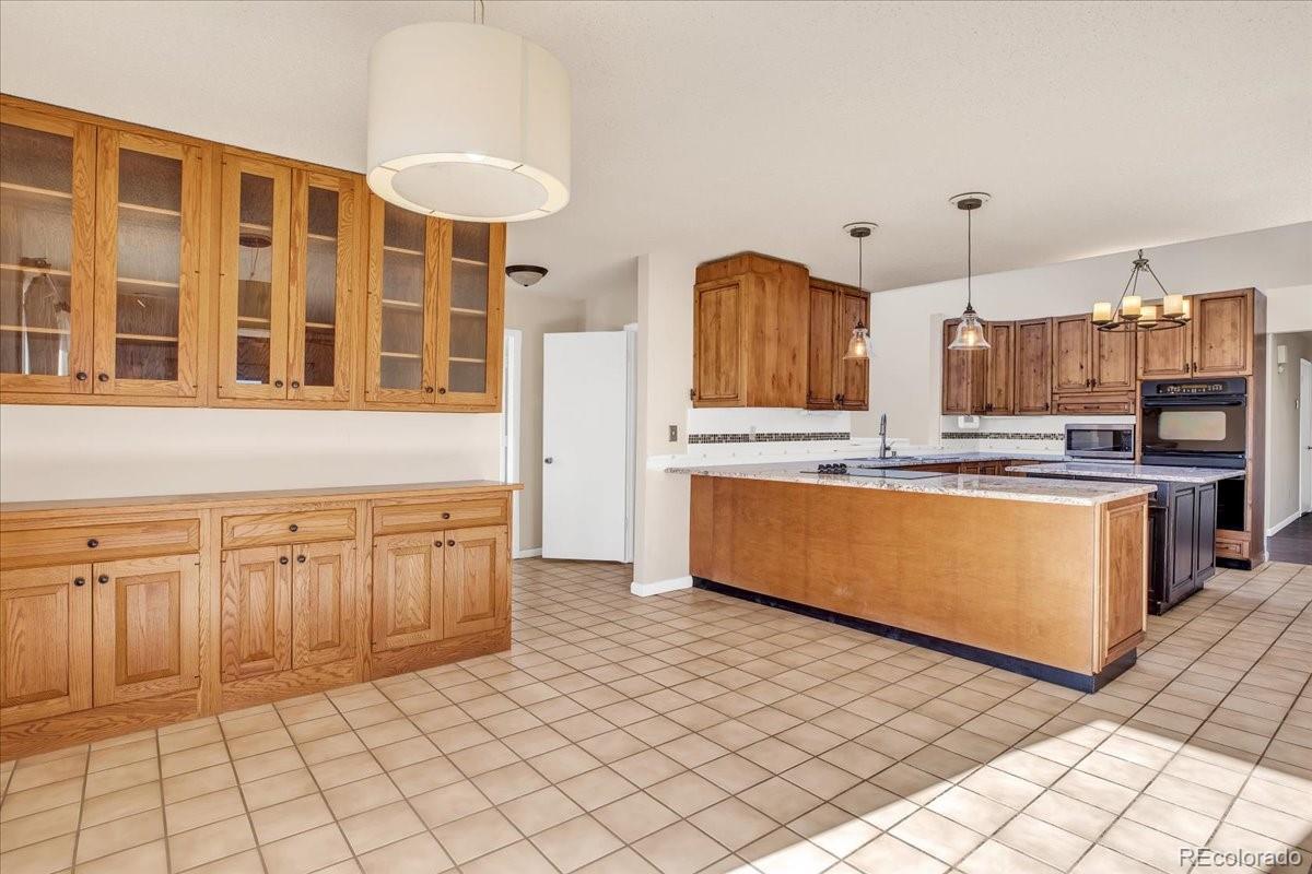 7720 Quincy Drive, Lakewood, CO 80235, 4 Bedrooms Bedrooms, ,6 BathroomsBathrooms,Residential,For Sale,Quincy,REC3636540