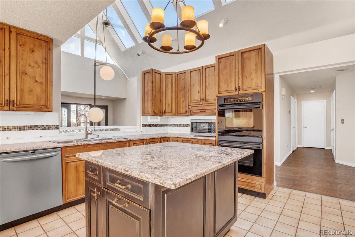 7720 Quincy Drive, Lakewood, CO 80235, 4 Bedrooms Bedrooms, ,6 BathroomsBathrooms,Residential,For Sale,Quincy,REC3636540