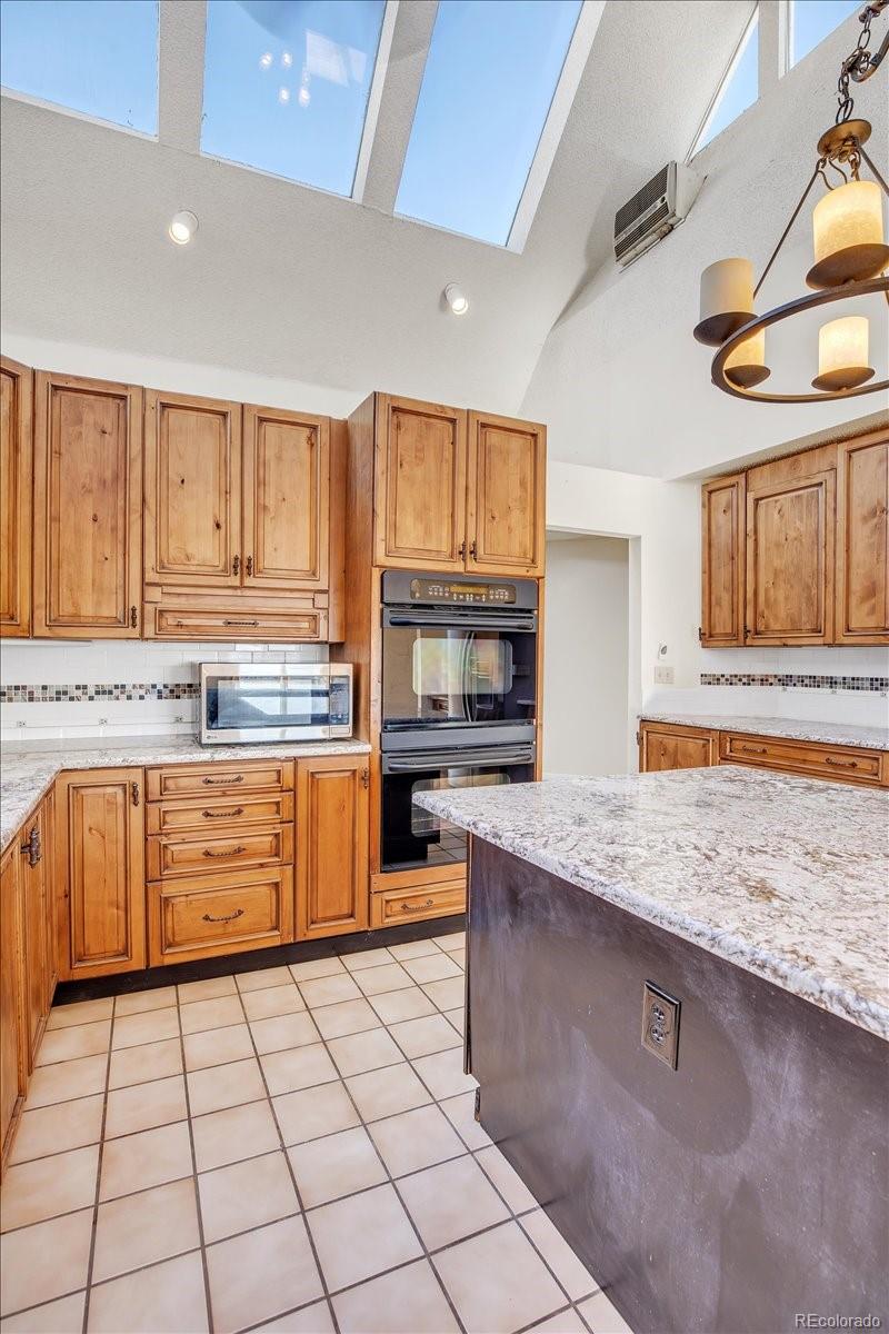7720 Quincy Drive, Lakewood, CO 80235, 4 Bedrooms Bedrooms, ,6 BathroomsBathrooms,Residential,For Sale,Quincy,REC3636540