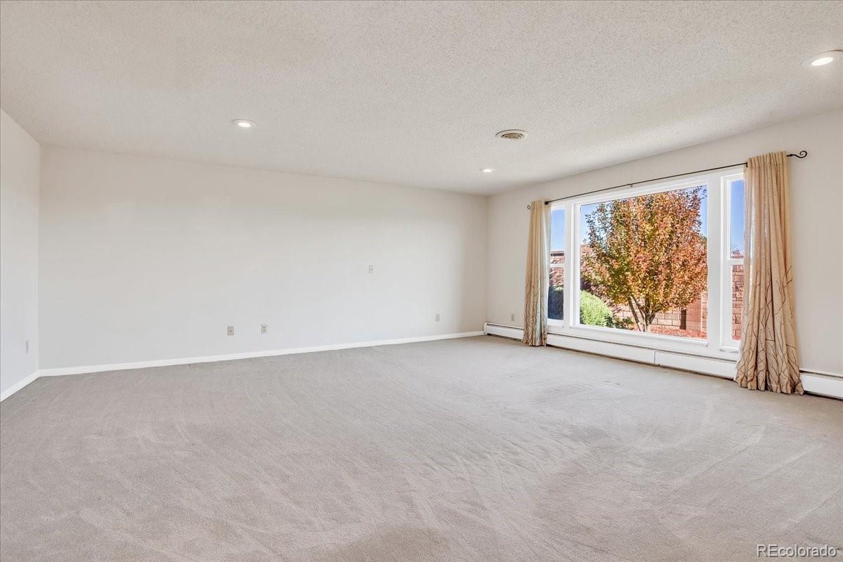 7720 Quincy Drive, Lakewood, CO 80235, 4 Bedrooms Bedrooms, ,6 BathroomsBathrooms,Residential,For Sale,Quincy,REC3636540