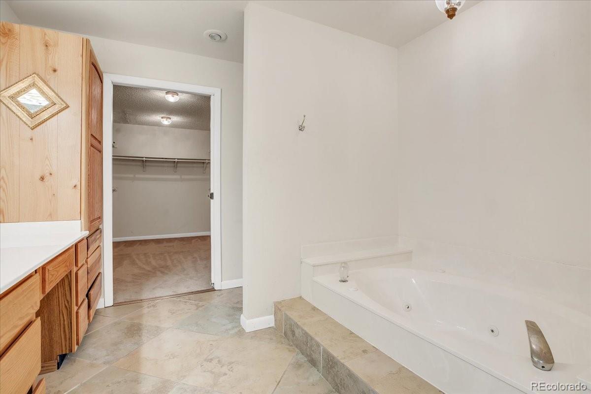7720 Quincy Drive, Lakewood, CO 80235, 4 Bedrooms Bedrooms, ,6 BathroomsBathrooms,Residential,For Sale,Quincy,REC3636540