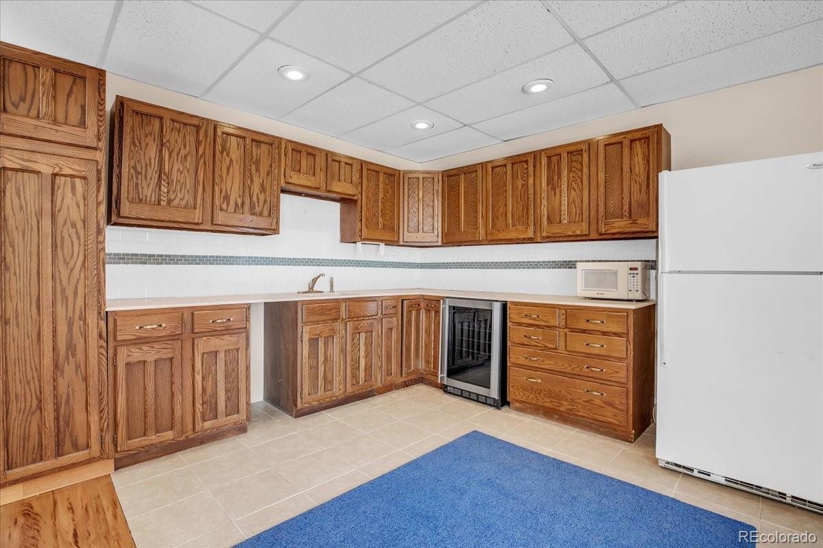7720 Quincy Drive, Lakewood, CO 80235, 4 Bedrooms Bedrooms, ,6 BathroomsBathrooms,Residential,For Sale,Quincy,REC3636540