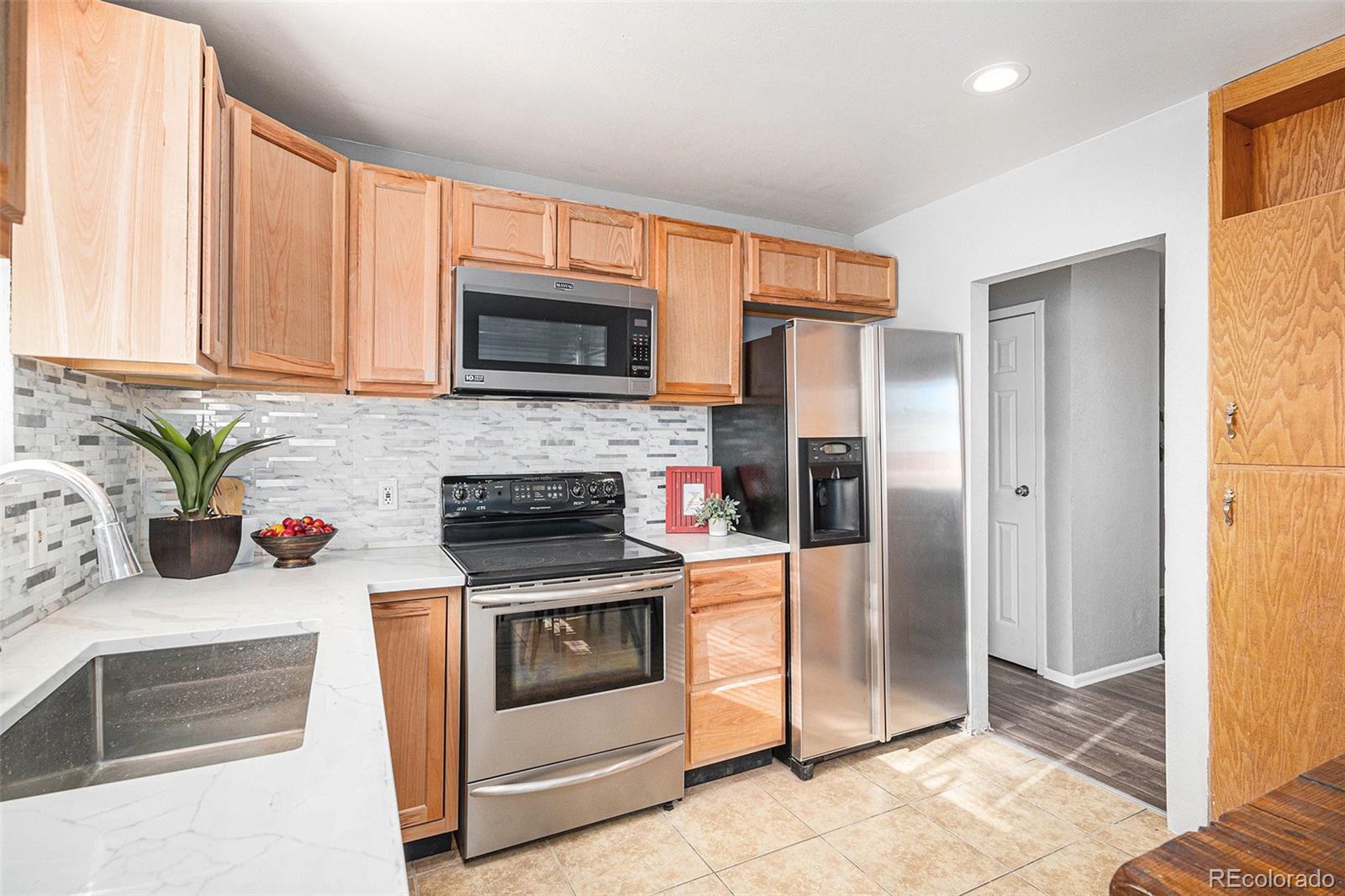 16720 Layton Avenue, Aurora, CO 80015, 4 Bedrooms Bedrooms, ,2 BathroomsBathrooms,Residential,For Sale,Layton,REC2066915
