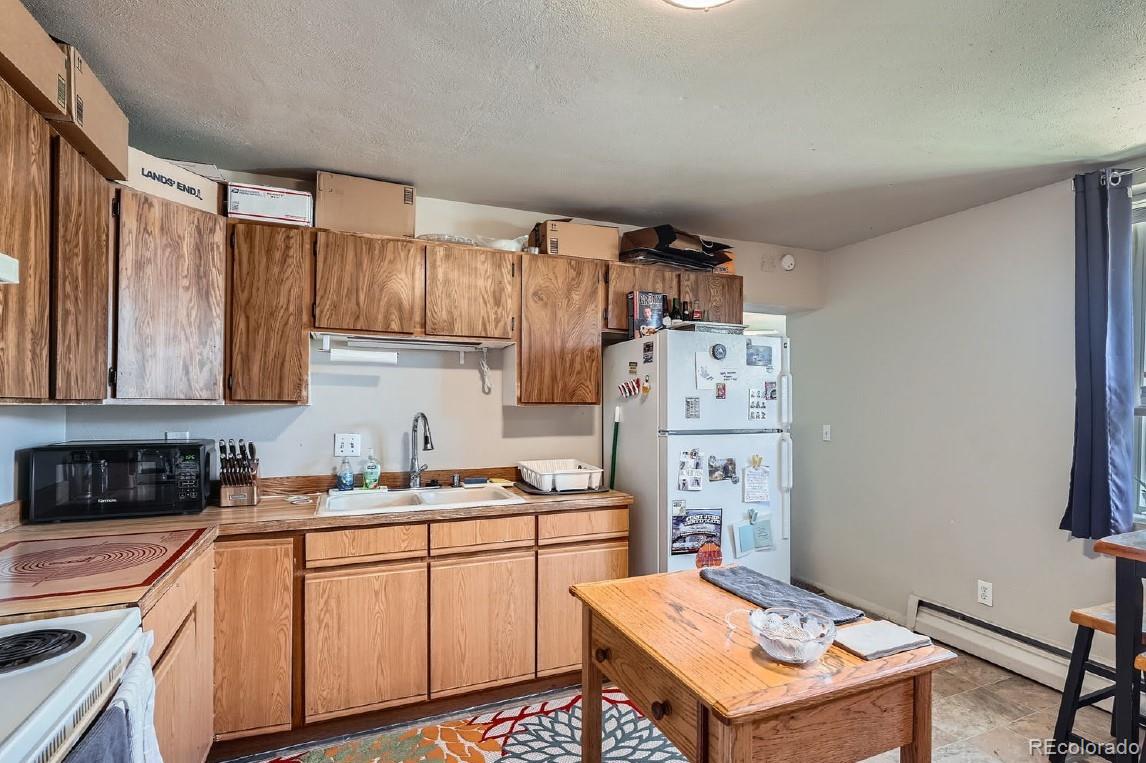 4489 Grant Street, Denver, CO 80216, 5 Bedrooms Bedrooms, ,3 BathroomsBathrooms,Income,For Sale,Grant,REC7233580