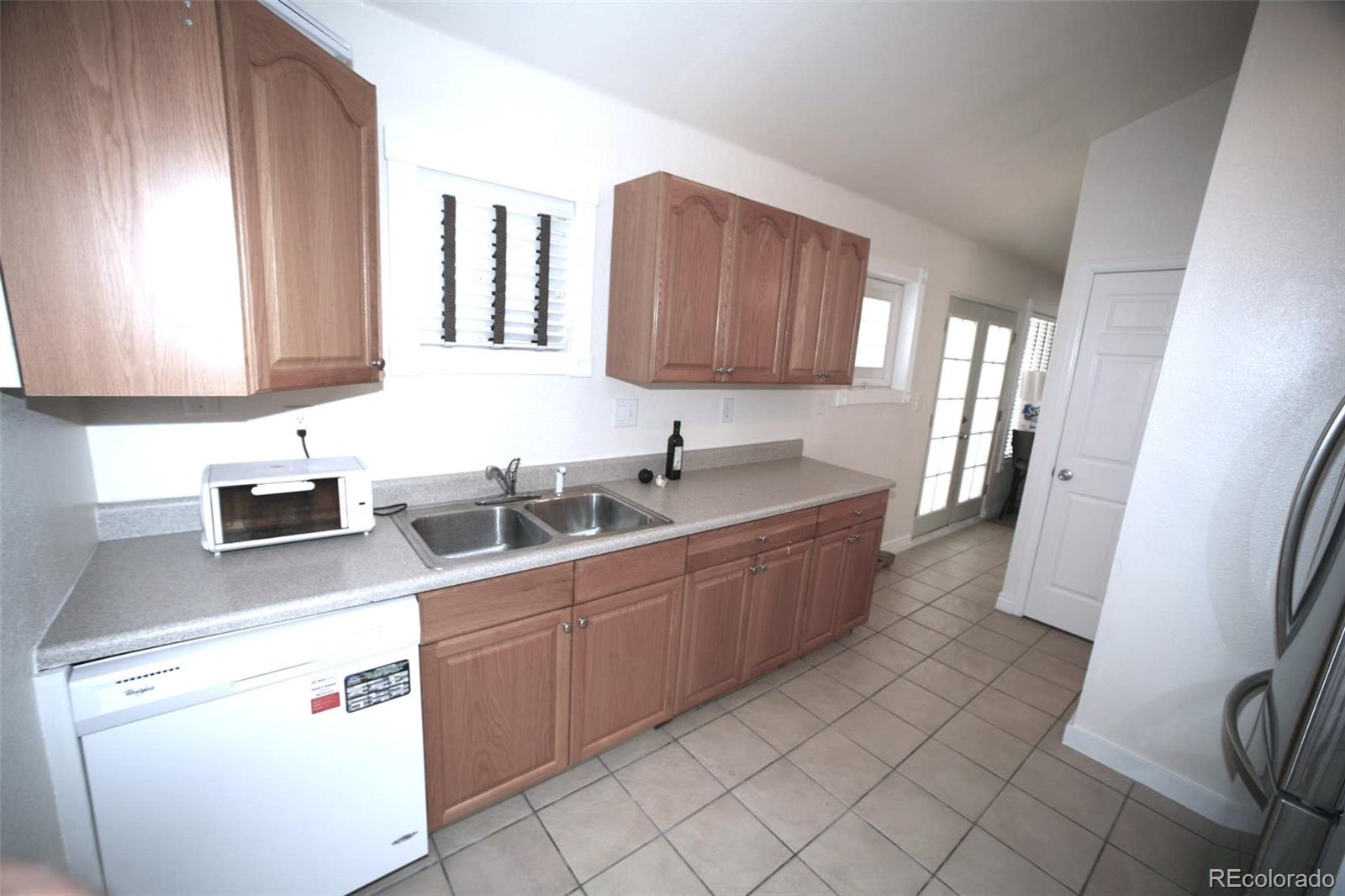 3027 Lawrence Street, Denver, CO 80205, 3 Bedrooms Bedrooms, ,2 BathroomsBathrooms,Income,For Sale,Lawrence,REC6064315