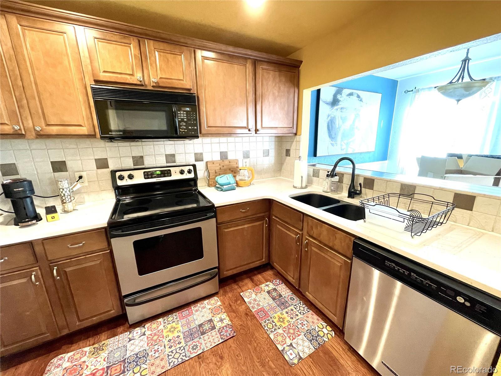 10330 Jewell Avenue #A, Lakewood, CO 80232, 4 Bedrooms Bedrooms, ,3 BathroomsBathrooms,Residential,For Sale,Jewell,REC9923163