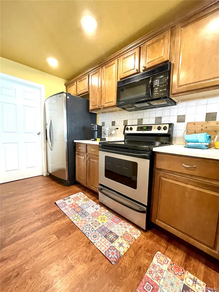 10330 Jewell Avenue #A, Lakewood, CO 80232, 4 Bedrooms Bedrooms, ,3 BathroomsBathrooms,Residential,For Sale,Jewell,REC9923163