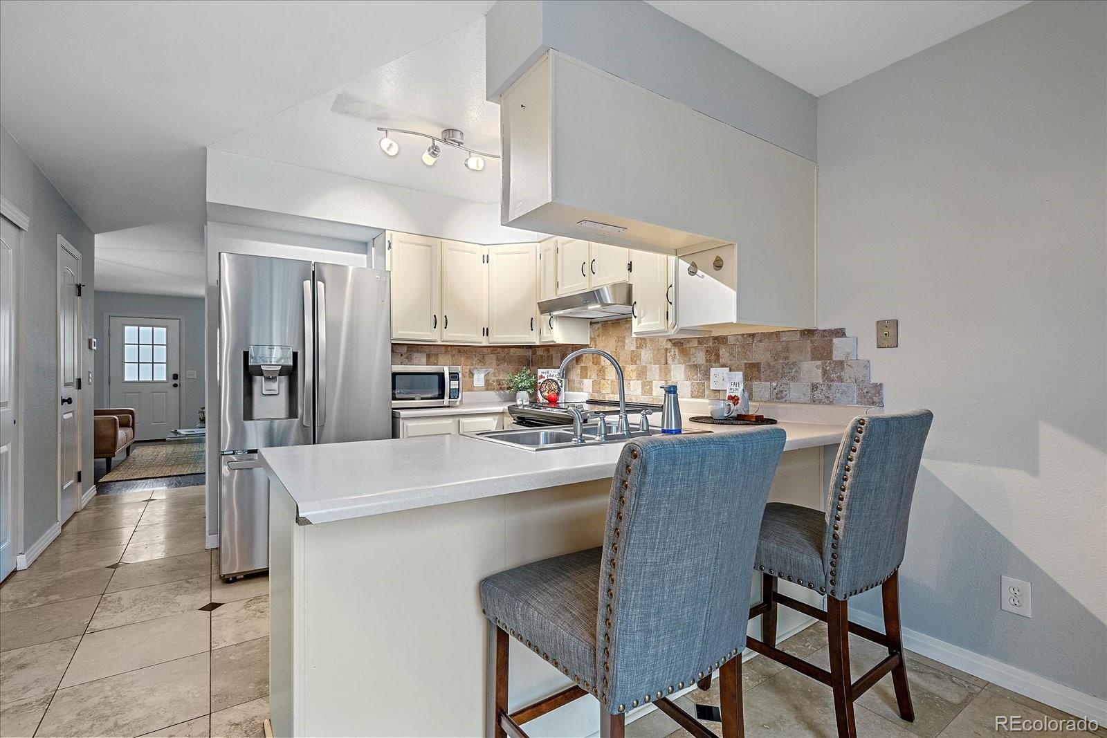 10681 Dartmouth Avenue, Lakewood, CO 80227, 3 Bedrooms Bedrooms, ,3 BathroomsBathrooms,Residential,For Sale,Dartmouth,REC9459323