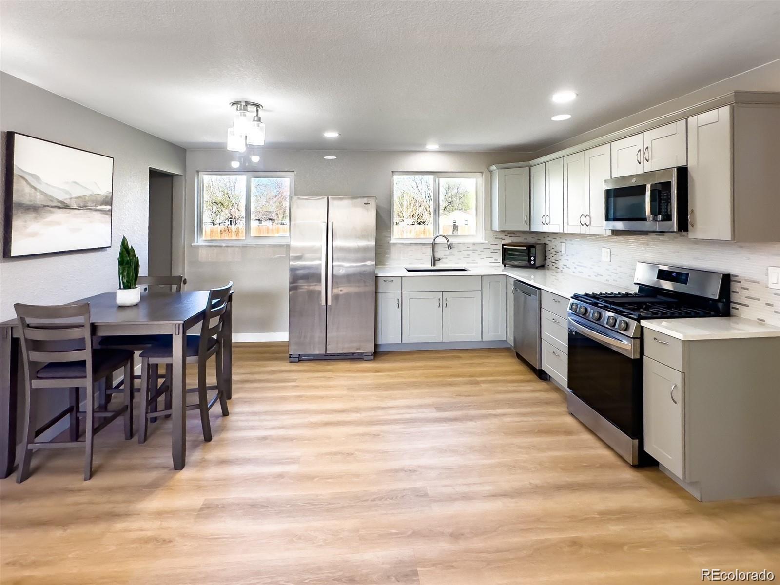 7054 Welch Court, Arvada, CO 80004, 4 Bedrooms Bedrooms, ,3 BathroomsBathrooms,Residential,For Sale,Welch,REC9923425