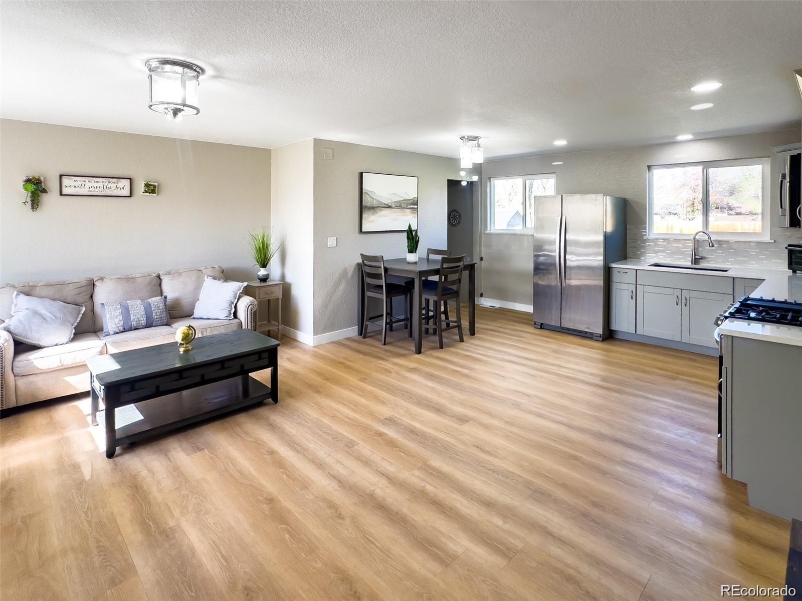 7054 Welch Court, Arvada, CO 80004, 4 Bedrooms Bedrooms, ,3 BathroomsBathrooms,Residential,For Sale,Welch,REC9923425