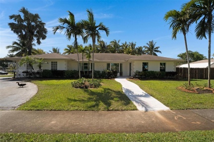 Large corner lot with tons of parking.